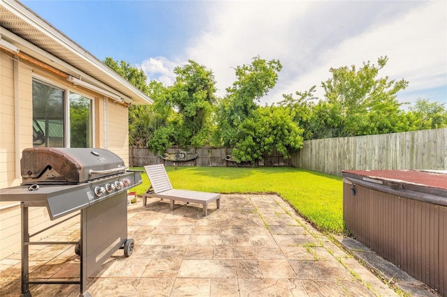 306 Jefferson Ave, Port Orange, FL 32127 - view of patio / terrace with a hot tub and a grill
