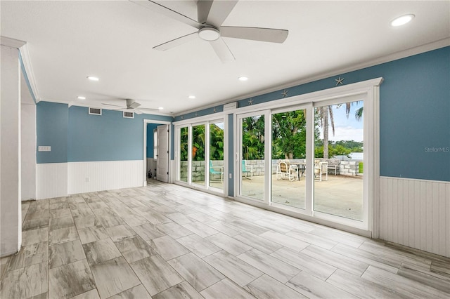 2576 Sunset Dr, New Smyrna Beach, FL 32168 - spare room featuring a wainscoted wall, a ceiling fan, recessed lighting, and wood walls