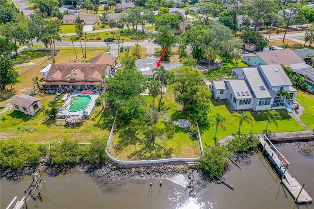 2576 Sunset Dr, New Smyrna Beach, FL 32168 - aerial view of residential area with a nearby body of water and a pool area