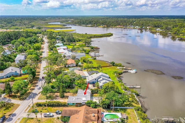 2576 Sunset Dr, New Smyrna Beach, FL 32168 - drone / aerial view of a nearby body of water and a heavily wooded area