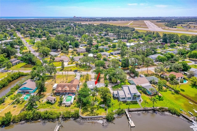 2576 Sunset Dr, New Smyrna Beach, FL 32168 - aerial view of property's location with a large body of water and nearby suburban area
