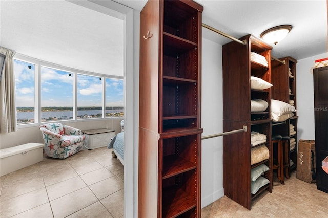 2625 S Atlantic Ave Unit 18Nw, Daytona Beach, FL 32118 - spacious closet with light tile patterned floors