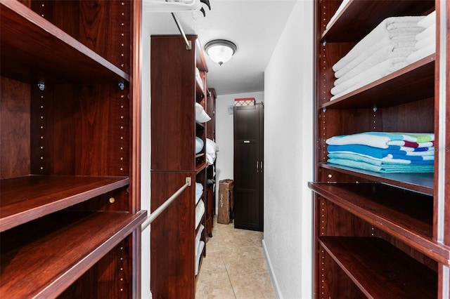 2625 S Atlantic Ave Unit 18Nw, Daytona Beach, FL 32118 - spacious closet featuring tile patterned floors