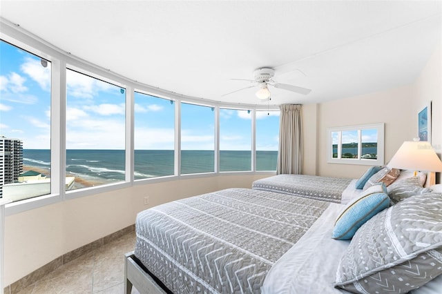 2625 S Atlantic Ave Unit 18Nw, Daytona Beach, FL 32118 - bedroom featuring a water view, baseboards, and a ceiling fan