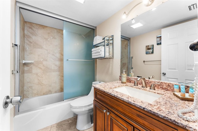 2625 S Atlantic Ave Unit 18Nw, Daytona Beach, FL 32118 - bathroom featuring tile patterned flooring, toilet, vanity, and bathtub / shower combination