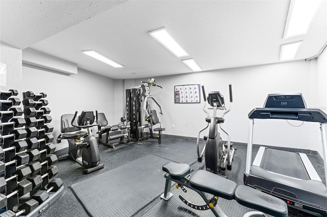 2625 S Atlantic Ave Unit 18Nw, Daytona Beach, FL 32118 - workout area with baseboards and a textured ceiling