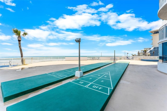 2625 S Atlantic Ave Unit 18Nw, Daytona Beach, FL 32118 - view of home's community with fence, shuffleboard, and a water view