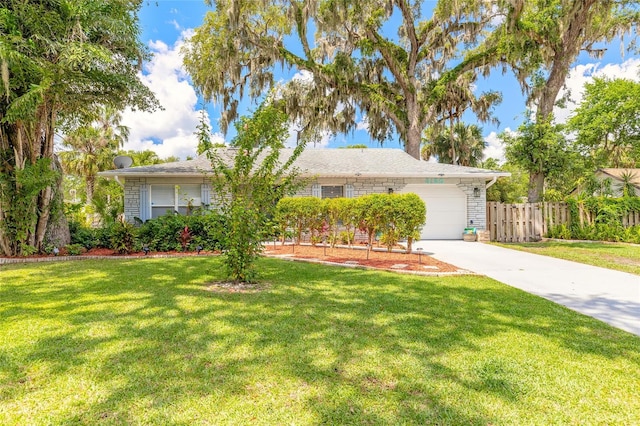 3120 Mango Tree Dr, Edgewater, FL 32141 - ranch-style home with a garage and concrete driveway