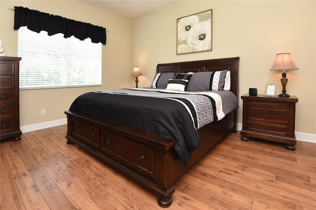1442 Carlow Cir, Ormond Beach, FL 32174 - bedroom featuring light wood-style flooring and baseboards