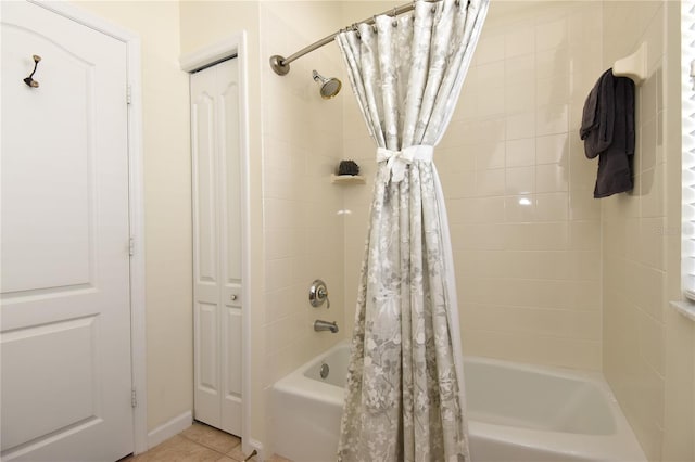 1442 Carlow Cir, Ormond Beach, FL 32174 - bathroom featuring shower / bath combo with shower curtain and tile patterned floors