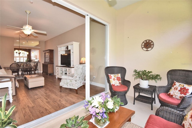 1442 Carlow Cir, Ormond Beach, FL 32174 - living room with a ceiling fan, hardwood / wood-style floors, and baseboards
