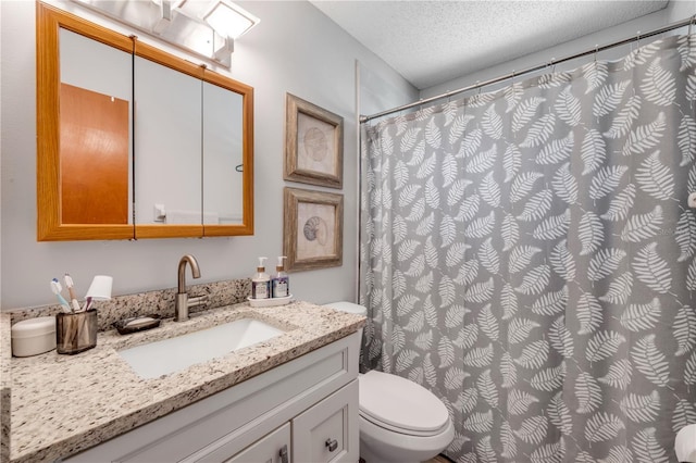 1205 Bond St, Edgewater, FL 32132 - bathroom with vanity, toilet, a textured ceiling, and a shower with shower curtain