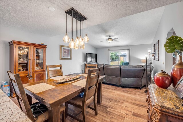 1205 Bond St, Edgewater, FL 32132 - dining area with a textured ceiling, light wood-style flooring, and ceiling fan