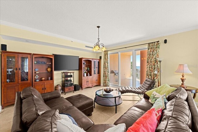 3245 S Atlantic Ave Unit 208, Daytona Beach, FL 32118 - living area featuring crown molding, a textured ceiling, and a chandelier
