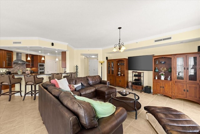 3245 S Atlantic Ave Unit 208, Daytona Beach, FL 32118 - living area featuring light tile patterned flooring, ornamental molding, and a chandelier