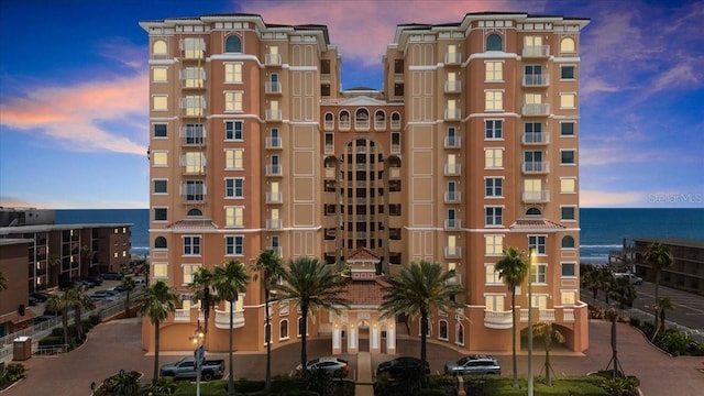 3245 S Atlantic Ave Unit 208, Daytona Beach, FL 32118 - view of building exterior featuring a water view