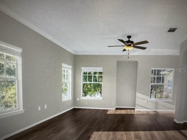 240 Villa Di Este Ter Unit 212, Lake Mary, FL 32746 - unfurnished room featuring wood finished floors, plenty of natural light, and baseboards