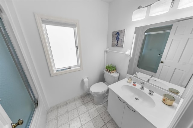 2961 Oceans Trce, Daytona Beach Shores, FL 32118 - bathroom with an enclosed shower, baseboards, toilet, and vanity