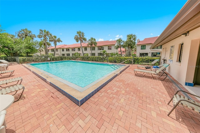 2961 Oceans Trce, Daytona Beach Shores, FL 32118 - community pool with a patio area and fence