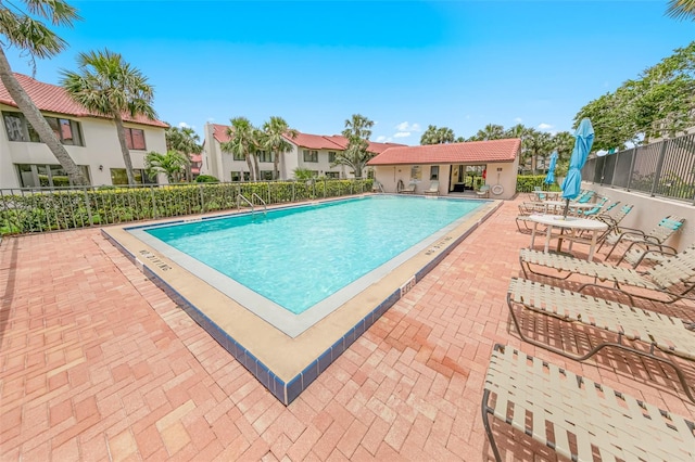 2961 Oceans Trce, Daytona Beach Shores, FL 32118 - community pool featuring fence and a patio area