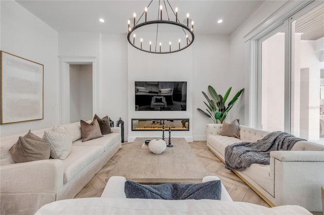 102 Inlet Shores Dr, New Smyrna Beach, FL 32168 - living area featuring a chandelier, recessed lighting, and baseboards