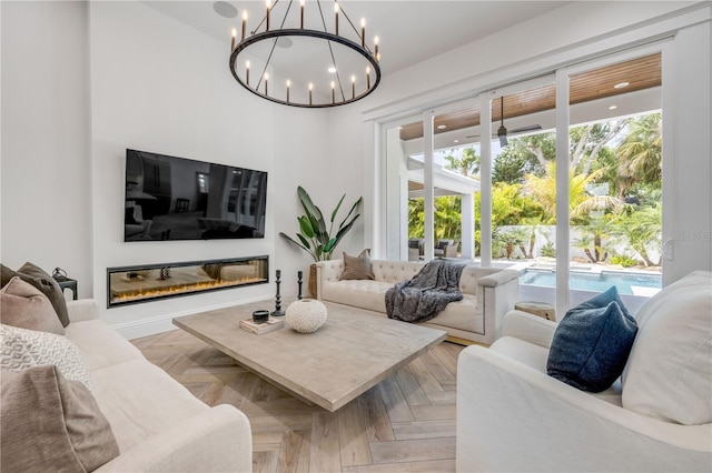 102 Inlet Shores Dr, New Smyrna Beach, FL 32168 - living area featuring a chandelier
