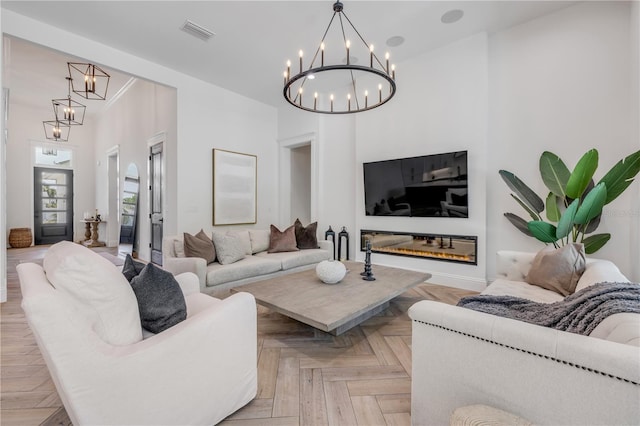 102 Inlet Shores Dr, New Smyrna Beach, FL 32168 - living area with a chandelier