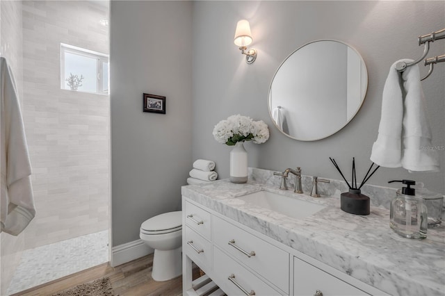 102 Inlet Shores Dr, New Smyrna Beach, FL 32168 - full bath with vanity, walk in shower, toilet, and wood finished floors