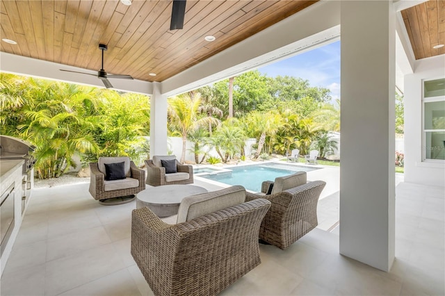 102 Inlet Shores Dr, New Smyrna Beach, FL 32168 - view of patio with ceiling fan, a grill, and a fenced backyard
