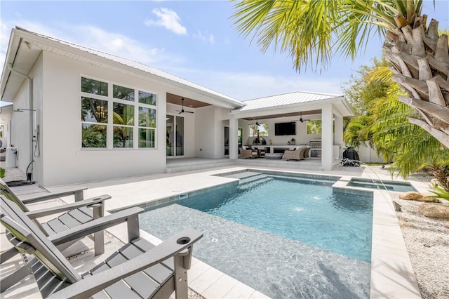 102 Inlet Shores Dr, New Smyrna Beach, FL 32168 - view of swimming pool with a ceiling fan, a patio area, an outdoor hangout area, and a pool with connected hot tub
