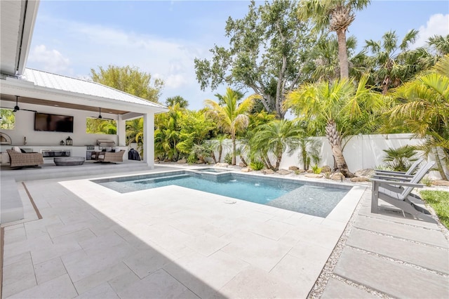 102 Inlet Shores Dr, New Smyrna Beach, FL 32168 - view of swimming pool featuring an outdoor hangout area, ceiling fan, a patio, a fenced backyard, and a pool with connected hot tub