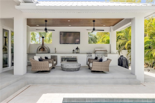 102 Inlet Shores Dr, New Smyrna Beach, FL 32168 - view of patio / terrace featuring ceiling fan, exterior kitchen, and grilling area