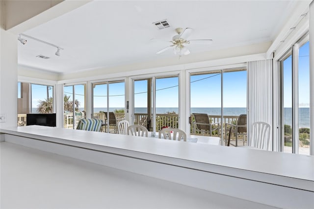 6320 S Atlantic Ave, New Smyrna Beach, FL 32169 - sunroom / solarium featuring a water view