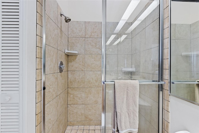 6320 S Atlantic Ave, New Smyrna Beach, FL 32169 - full bathroom with a stall shower and a closet