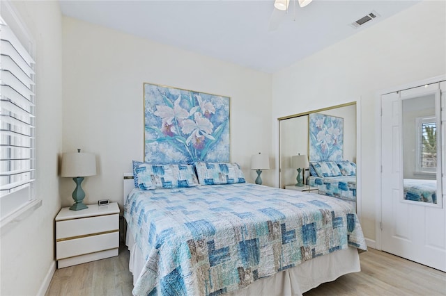 6320 S Atlantic Ave, New Smyrna Beach, FL 32169 - bedroom with light wood-style flooring, a closet, baseboards, and ceiling fan
