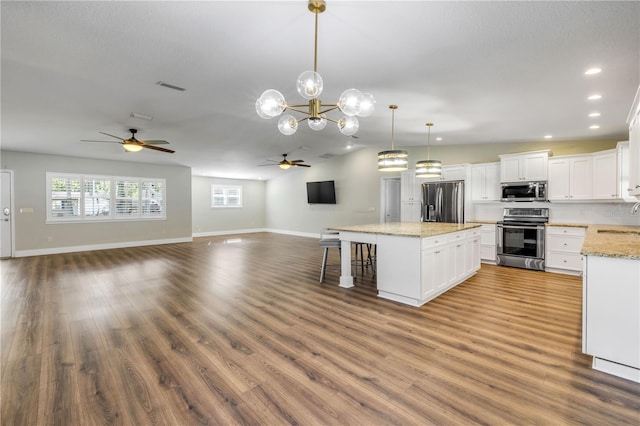 1144 Corbin Park Rd, New Smyrna Beach, FL 32168 - kitchen featuring stainless steel appliances, ceiling fan, open floor plan, a sink, and recessed lighting
