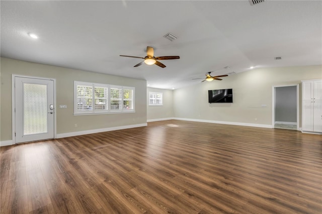 1144 Corbin Park Rd, New Smyrna Beach, FL 32168 - unfurnished living room with ceiling fan, dark wood-type flooring, baseboards, vaulted ceiling, and recessed lighting