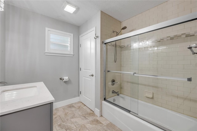1144 Corbin Park Rd, New Smyrna Beach, FL 32168 - bathroom with baseboards, shower / bath combination with glass door, and vanity
