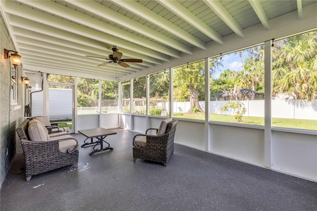 1144 Corbin Park Rd, New Smyrna Beach, FL 32168 - sunroom with ceiling fan, plenty of natural light, beam ceiling, and outdoor lounge area