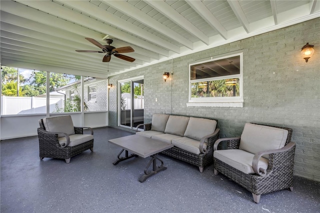 1144 Corbin Park Rd, New Smyrna Beach, FL 32168 - sunroom / solarium with an outdoor hangout area, a ceiling fan, and beam ceiling