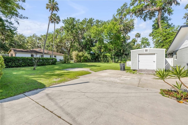 1144 Corbin Park Rd, New Smyrna Beach, FL 32168 - view of green lawn with view of wooded area