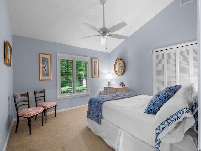 1215 Commodore Dr, New Smyrna Beach, FL 32168 - carpeted bedroom with a closet, lofted ceiling, and ceiling fan