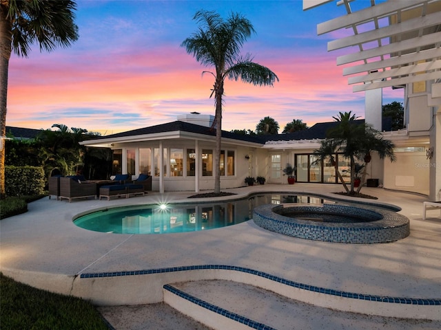 1215 Commodore Dr, New Smyrna Beach, FL 32168 - view of pool featuring outdoor lounge area, a patio area, a pergola, and a pool with connected hot tub