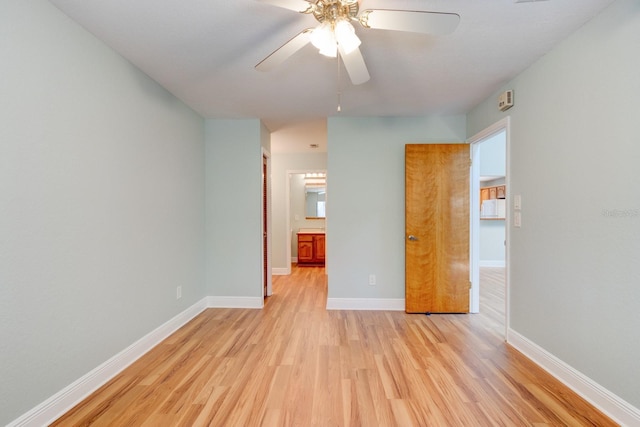 488 Shorewood Ln, New Smyrna Beach, FL 32168 - unfurnished bedroom with light wood-style flooring, baseboards, and a ceiling fan