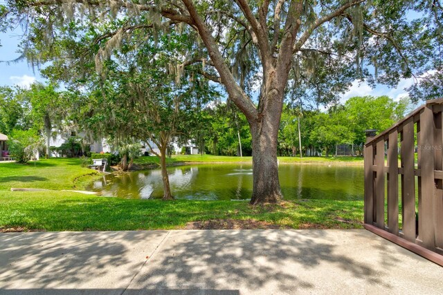 488 Shorewood Ln, New Smyrna Beach, FL 32168 - view of grassy yard with a water view