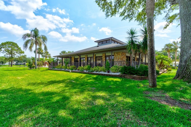 488 Shorewood Ln, New Smyrna Beach, FL 32168 - view of front of house with a front lawn