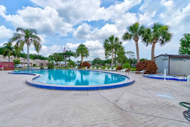 488 Shorewood Ln, New Smyrna Beach, FL 32168 - community pool with a patio area