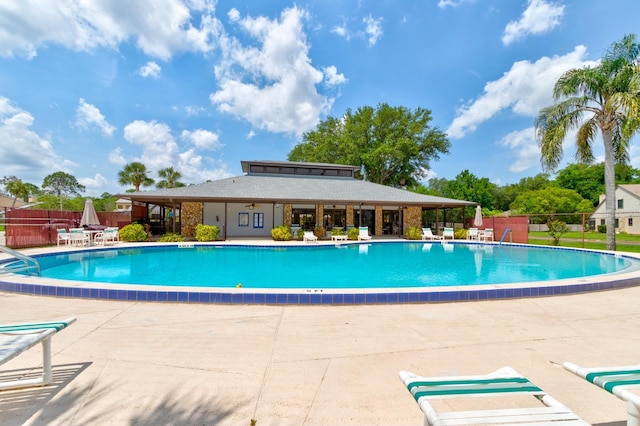 488 Shorewood Ln, New Smyrna Beach, FL 32168 - community pool featuring a patio area