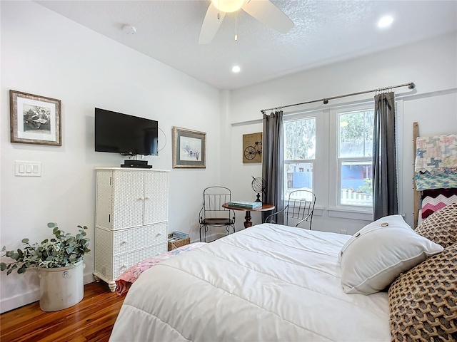 216 Murray St, New Smyrna Beach, FL 32168 - bedroom featuring wood finished floors, a ceiling fan, recessed lighting, and baseboards