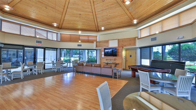 4620 Riverwalk Village Ct Unit 7306, Ponce Inlet, FL 32127 - dining area featuring a towering ceiling, wood ceiling, and wood finished floors